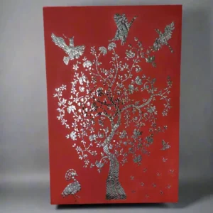 Red base Thikri work wall panel with silver mirror inlay floral motifs.