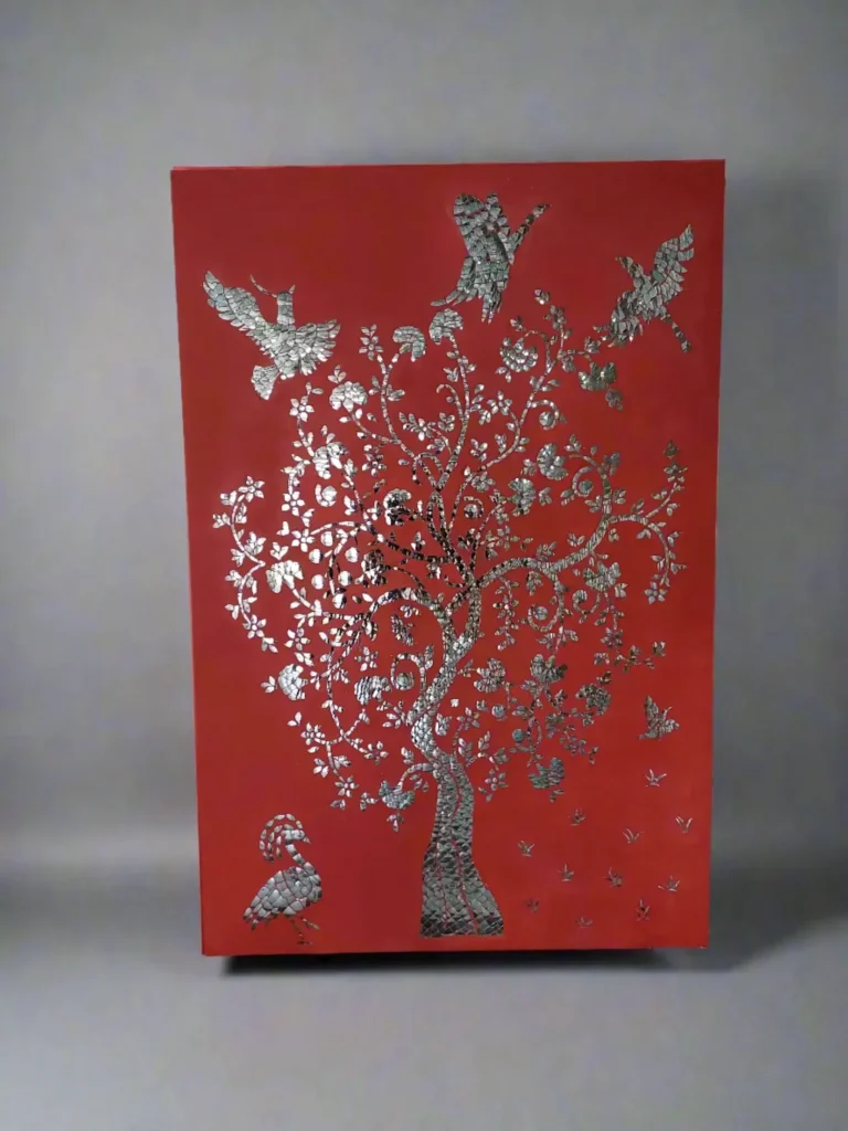 Red base Thikri work wall panel with silver mirror inlay floral motifs.